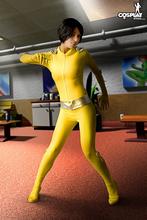 Devora in yellow costume 13